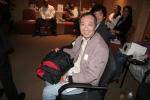 Dr. Hillary Cheng likes the raffle prize that he won